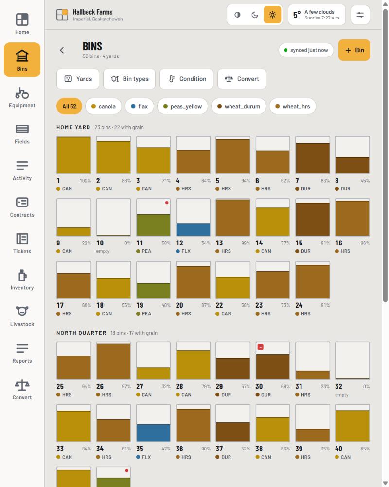 The bin yard: fifty-two bins drawn as fill levels, grouped by yard, each showing its crop and percentage.